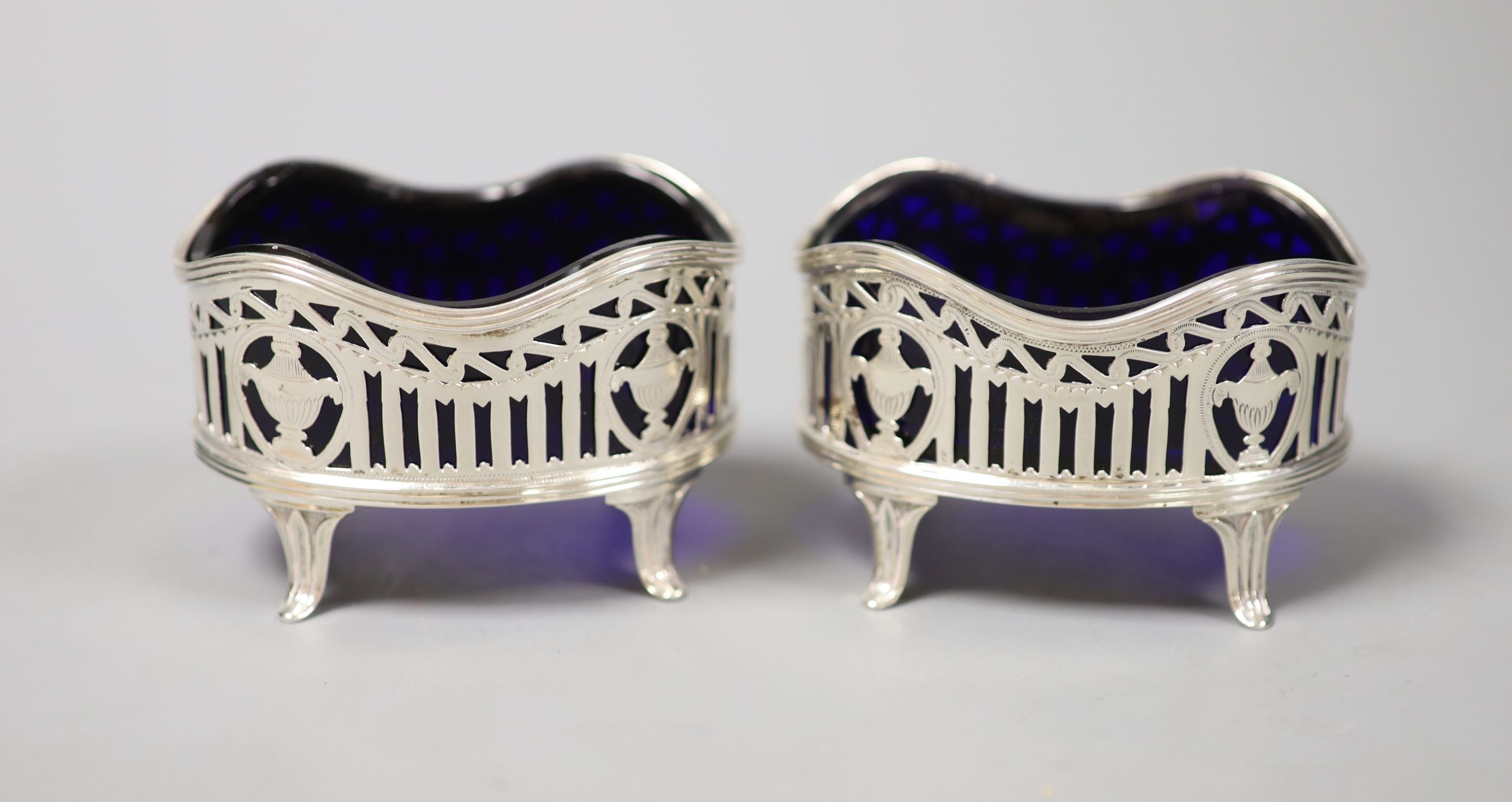 A pair of Victorian pierced silver oval salts, Thomas Bradbury & Sons, London, 1892, 8cm.